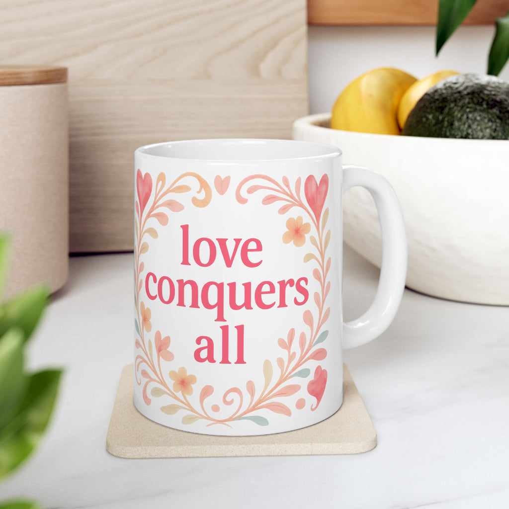 Love Conquers All Ceramic Mug — Floral Heart Inspirational Coffee Cup (11oz/15oz)